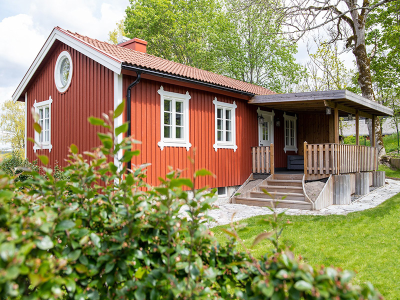 Ommalning fasad pa 1.5planshus Orby Hogdalen